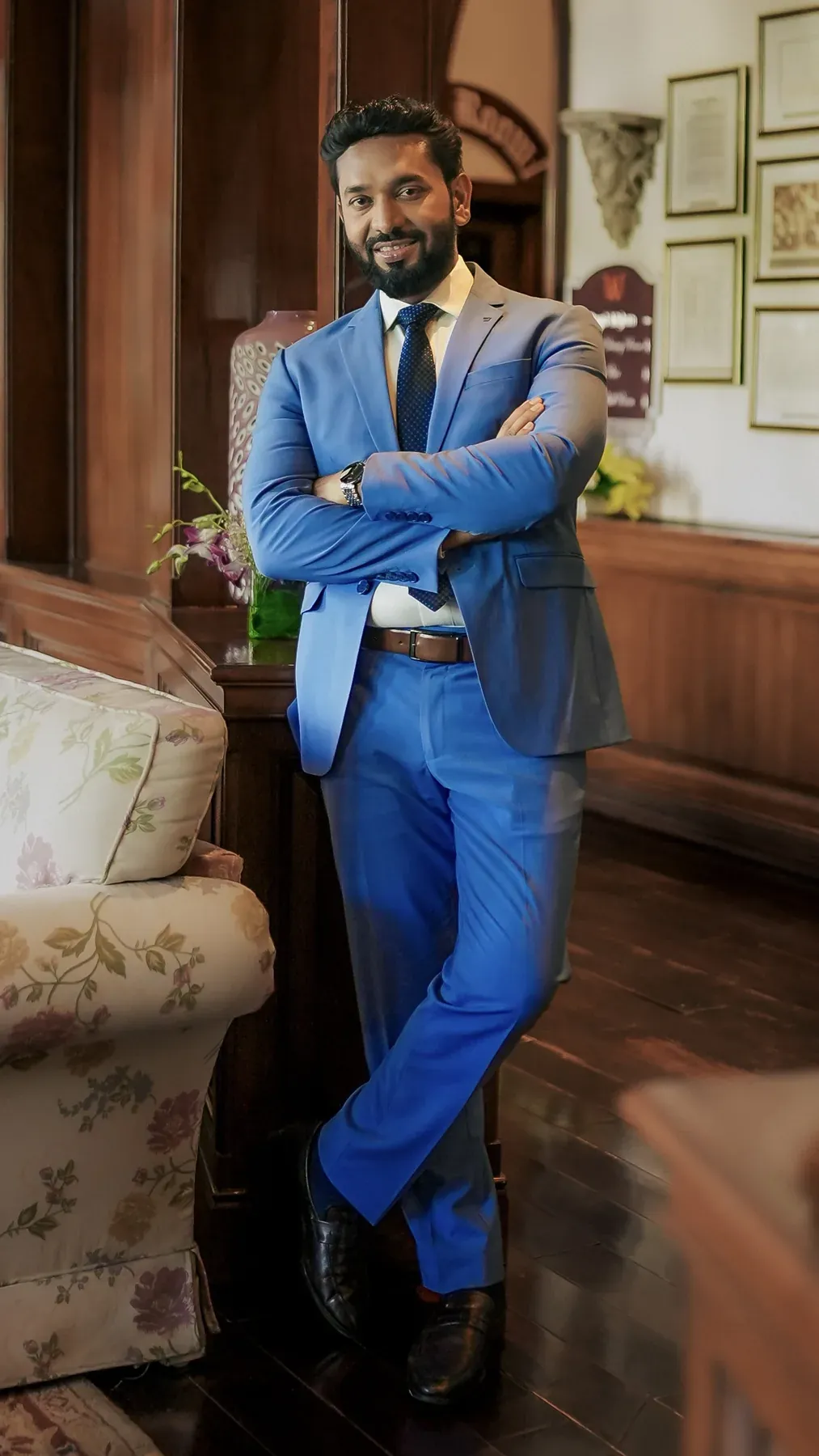 Ashwani Kumar in a blue suit, full-length portrait